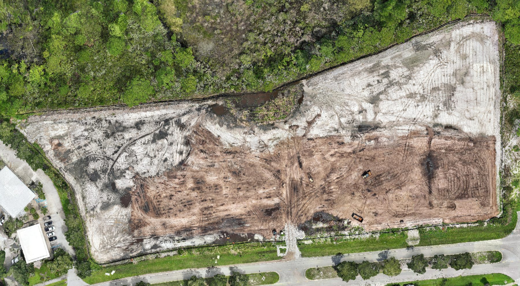 Orthomosaic of a commercial construction site in Florida with civil design overlays